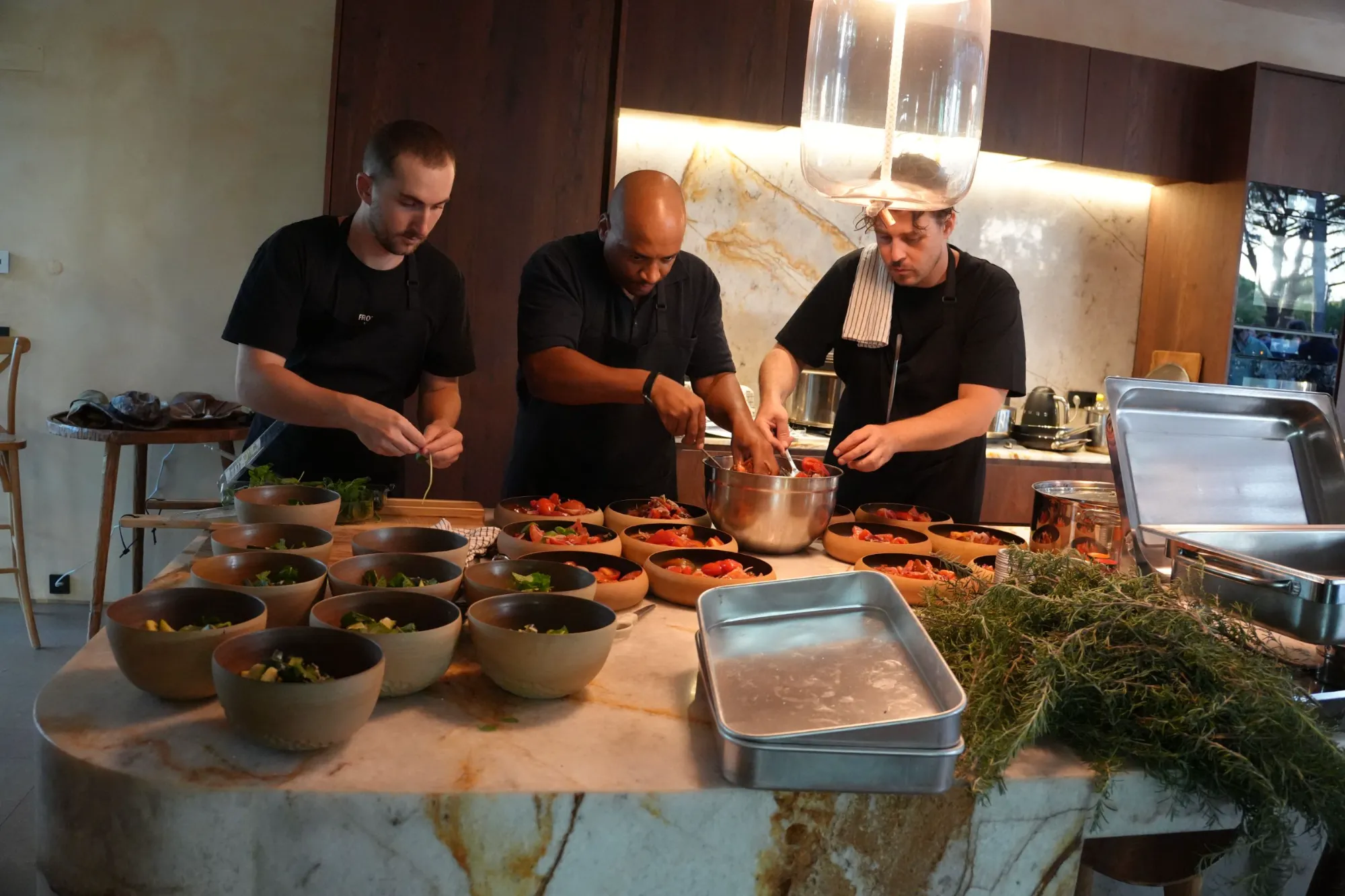 The kitchen island, with the chefs at work